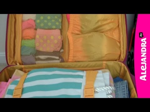 Part of a video titled How to Pack a Suitcase for Organized Travel - YouTube