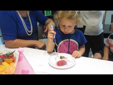 Enjoying her ice cream cake