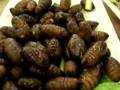 Frying live silkworms