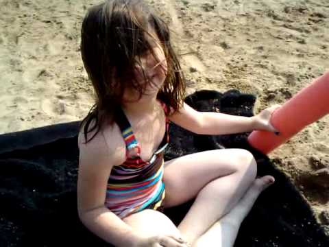 Kyra playing on beach