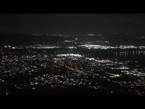 zoomed in into the quiet and distant city lights.