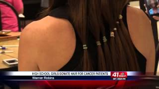 preview picture of video 'Warner Robins High girls shed locks to help cancer patients'