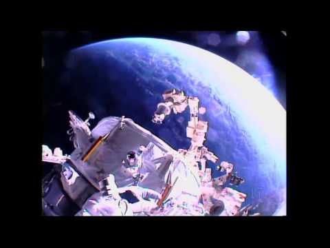 American Astronauts Install New Docking Port for U S  Commercial Crew Vehicles