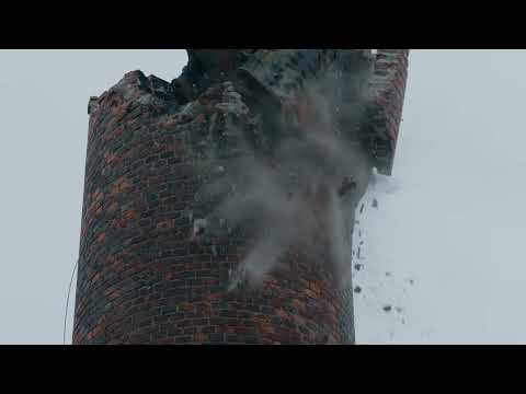 Schornsteinabbruch in Wien - Volvo-Abbruchbagger EC750E HR