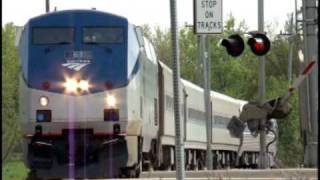 preview picture of video 'Amtrak 382 with P42 63 and great K5LA action - Quincy, IL 5/2/09'