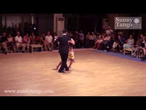  Sebastian Jimenez  and  Maria Ines Bogado  are  dancing  to  the  tango  "  Todo es amor  "  by  Fulvio Salamanca  at  Sunny Tango Festival  in  2014