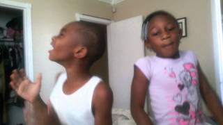 AJ and Jalia singing I'm coming Lord all by myself