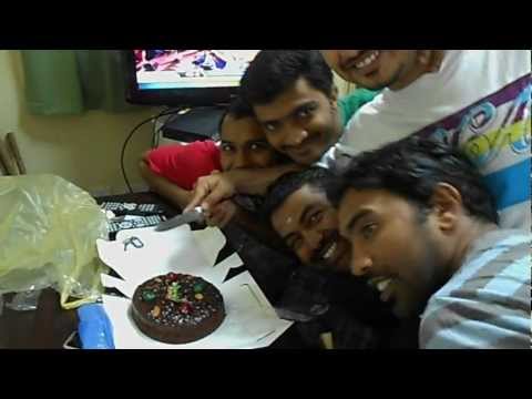 Hashim trying to take picture while our Christmas cake cutting..
