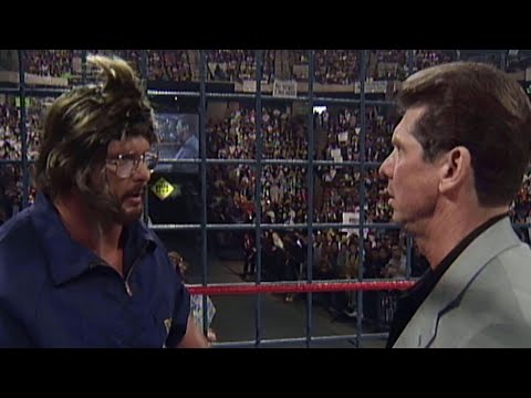 "Stone Cold" Steve Austin disguises himself as a cameraman to launch a sneak attack on Mr. McMahon