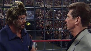 &quot;Stone Cold&quot; Steve Austin disguises himself as a cameraman to launch a sneak attack on Mr. McMahon