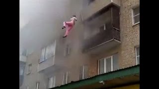 LiveLeak - Family with children jumped out of windows to escape the fire