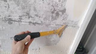 How to remove tile adhesive on walls