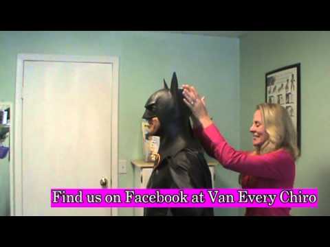 Batman gets KST Chiropractic adjustment at Van Every in Royal Oak