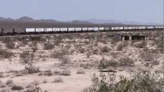 preview picture of video 'BNSF Needles sub -  A stack train is heading west going through Danby Station (California).'