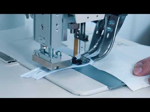 Automated workstation for sewing a zipper from a roll while cutting the center of the fabric EWS 9987 ASS video