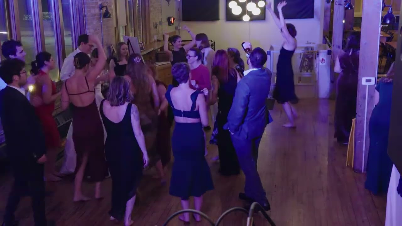 Bride dances with everyone @ Anodyne Coffee