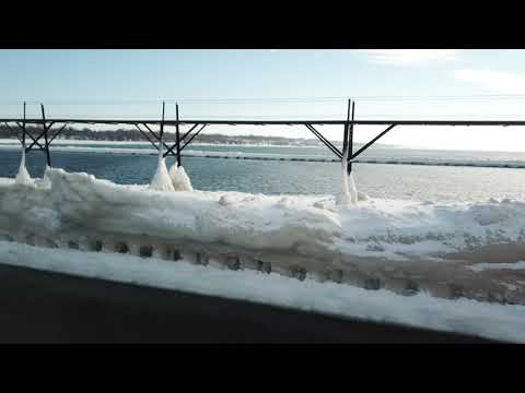 Thick Snow Coats St Joseph Lighthouses After Winter Storm Sweeps Through Michigan