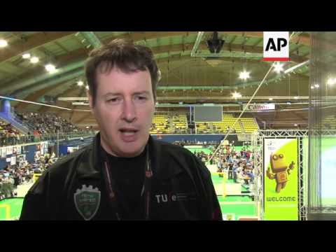 More than 1,000 robots from 40 nations compete in RoboCup football tournament