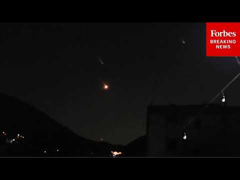 Flurry Of Iranian Missiles Are Seen Launching Toward Israel After U.S.-Israeli Strikes On Iran