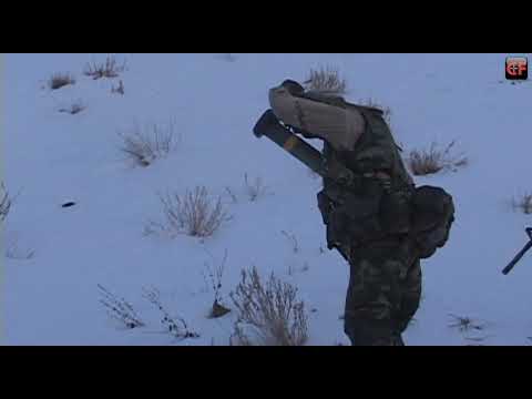Firing AT4 into cave during Operation Anaconda, Afghanistan 2002
