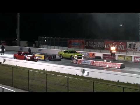 2011 SRT8 392 Challenger vs. 2011 Camaro SS Race 1 - Road Test TV ®
