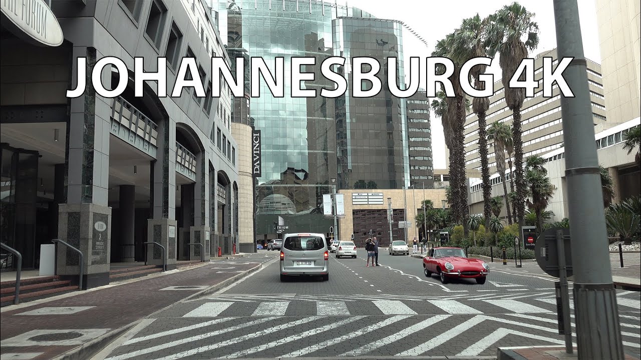 Immersive street-level walking tour through Johannesburg City, South Africa, showcasing authentic urban landscapes, local architecture, and the vibrant atmosphere of the city's neighborhoods