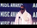 Busta Rhymes Presents The Award For Artist Of The Year 52nd American Music Awards