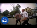 Bodycam video shows police officer PUNCHING man in face