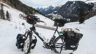 preview picture of video 'Cycling Switzerland, in the snowy passes'