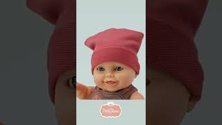 Realistická panenka chlapeček Guillo v růžové čepici od firmy Paola Reina ze Španělska