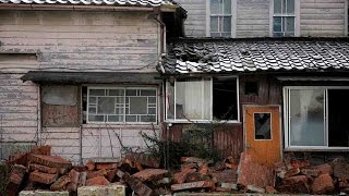 Some Fukushima residents return home, and conduct radiation testing