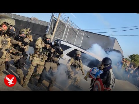 Captain America protester detained by ICE agents in Chicago