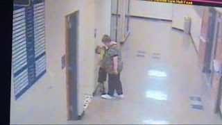 Teacher grabs kindergartner by face