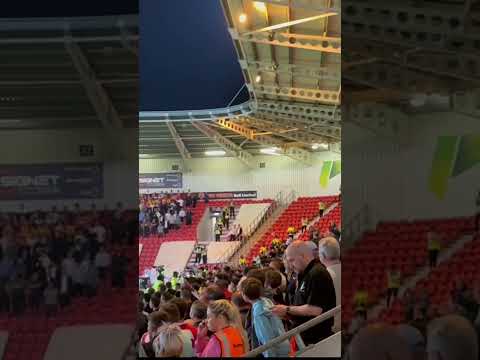 Max Stryjek getting rid of Thimothée Lo-Tutala water bottle with penalty taker notes on.