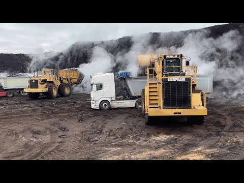 Caterpillar 990 Wheel Loaders Loading Coal On Trucks With Three Passes - S.G.M Melidis