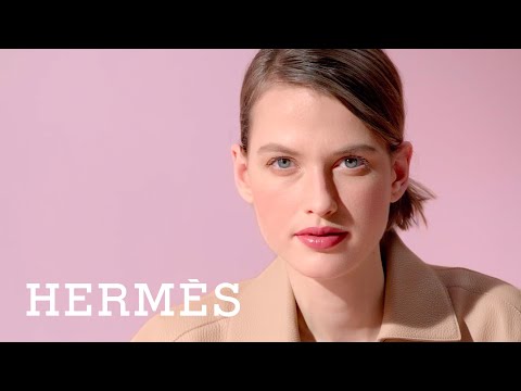 Applying your Rouge Hermès satin lipstick