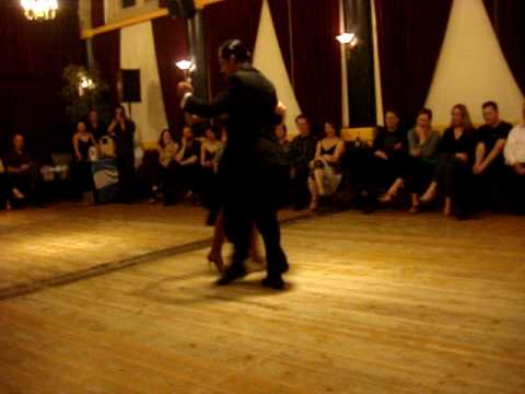  Roberto Leiva  and  Maricel Gomez  are  dancing  to  a  tango