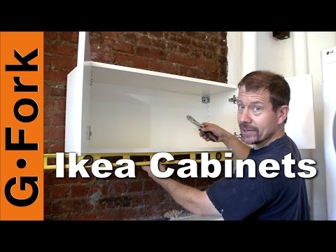 Part of a video titled Hang Ikea Cabinets - GardenFork - YouTube