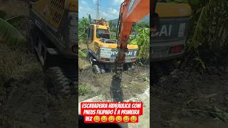 escavadeira hidráulica com pneu eu nunca tinha visto#caminhão #caminhoneiro