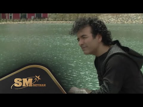Arada Bir - Oğuz Aksaç