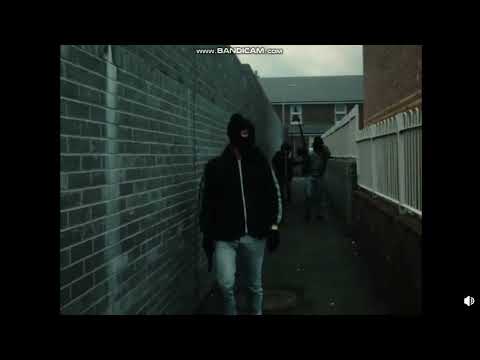 IRA Belfast Brigade Volunteers on foot patrol during IRA Vol Rob Russell extradition riot, August 88