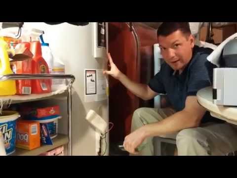 Change a hot water heater element without draining or spilling water