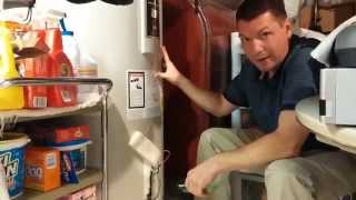 Change a hot water heater element without draining or spilling water