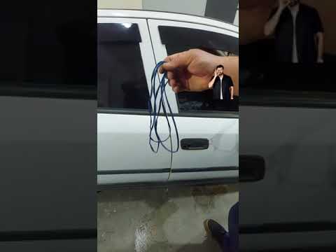 como abrir a porta do carro com cadarço