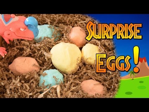 Fizzing dinosaur surprise eggs -- magic hatching eggs filled with dinosaur toys, dino skulls Video