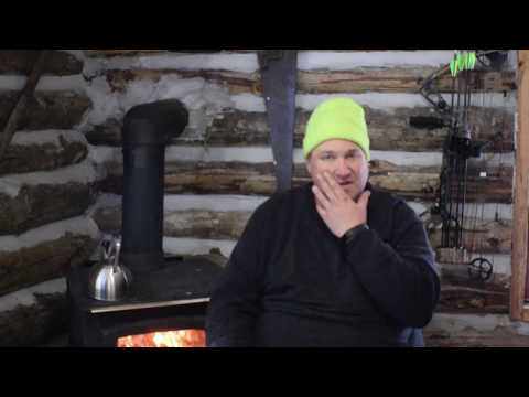 Off Grid Cabin questions answered about chinking and my chimney installation Video