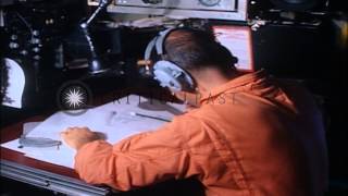 Men on board VW-4 hurricane hunter plane while in flight during Project Storm fur...HD Stock Footage