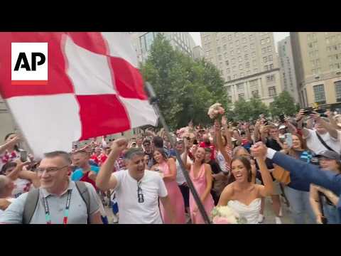 Croatia fans marching through Philadelphia crash wedding party