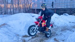 Kawasaki Ksr  studded tires riding in the snow