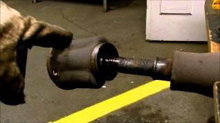 Installation of the drive shaft boot on a 1964 Chrysler 300K